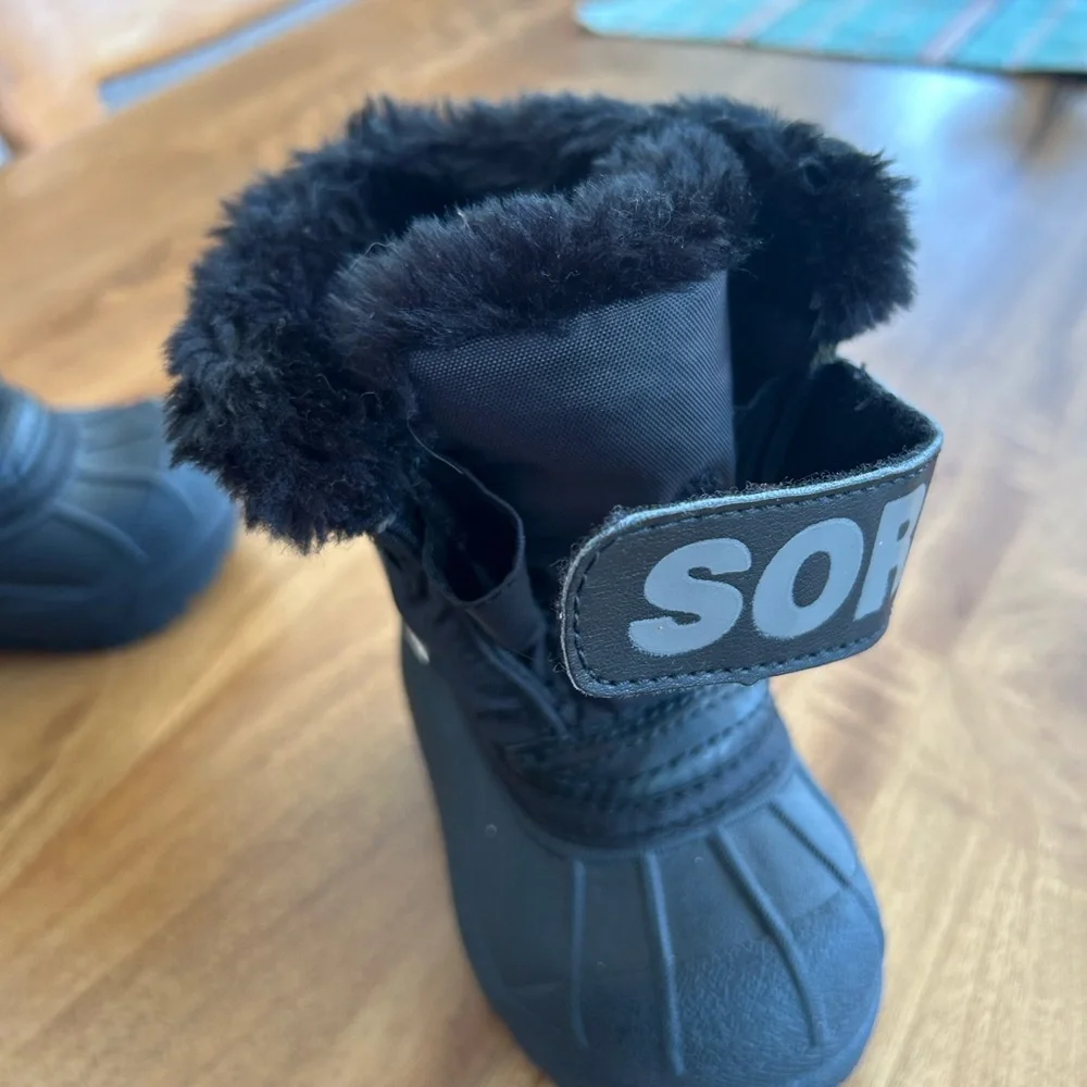Sorel Kids Black Snow Boots with Velcro strap and Polar Bear Accent. Waterproof.